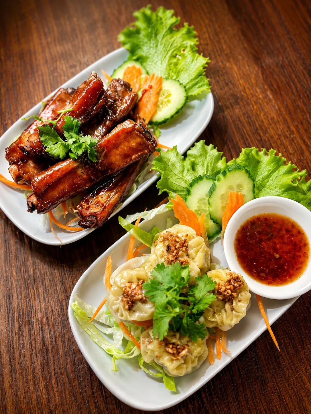 Glazed ribs and dumplings served with salad and dipping sauce